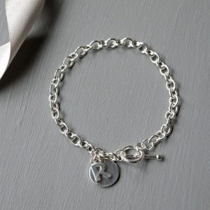 The Best Luxury Gift Ideas for Women 3 Sterling Silver Initial Charm Bracelet