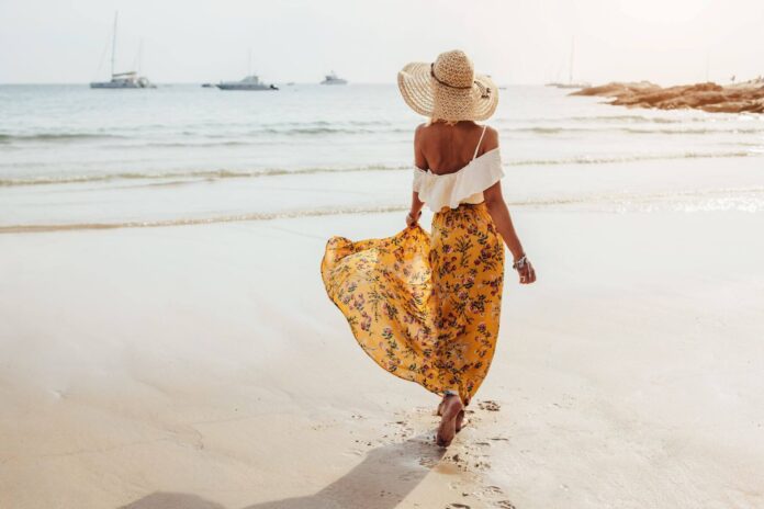 woman on the beach in the hamptons