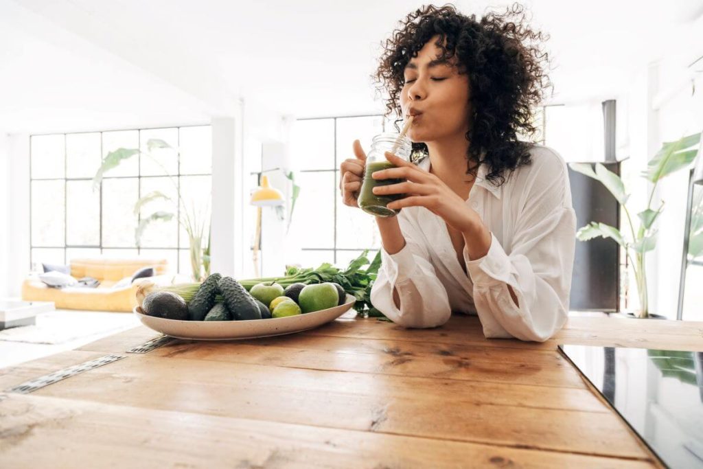 10 Must-Try Wellness Trends of 2025 for a Healthier You 3 women drinking a fruit choice